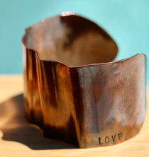 Load image into Gallery viewer, Rustic Fold-Formed Copper Cuff Bracelet Hand Stamped with LOVE